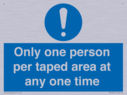 only-one-person-per-taped-area-at-any-one-time~